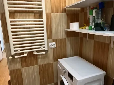 zonă spălătorie inchiriere apartament Popești Leordeni Ilfov